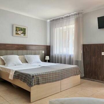 Трехместный номер с собственной ванной комнатой в Гостинице Домик у моря