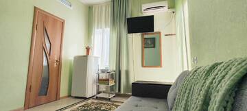 Улучшенный четырехместный номер в Гостинице Домик у моря