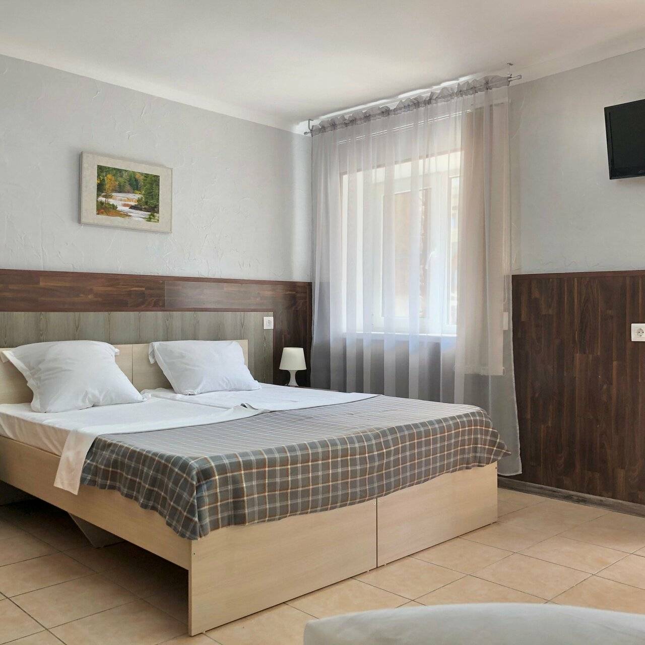 Фотографии номера Трехместный номер с собственной ванной комнатой в Гостинице Домик у моря Анапа