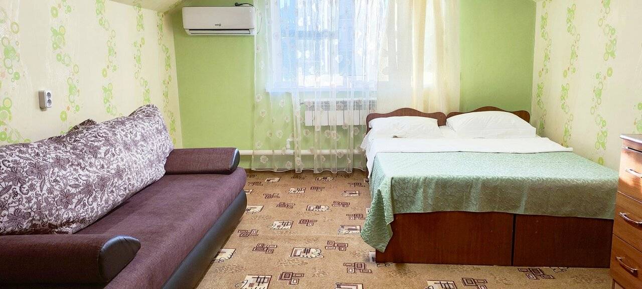 Фотографии номера Семейный номер с террасой в Гостинице Домик у моря Анапа