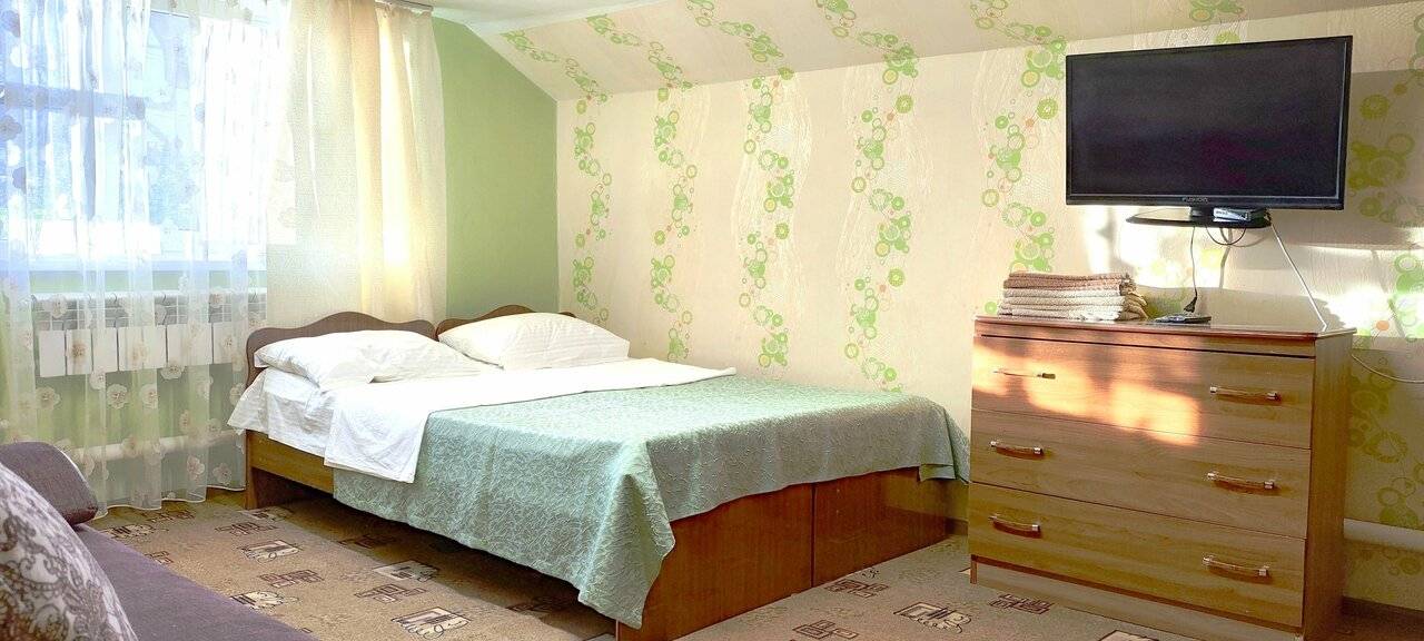 Фотографии номера Семейный номер с террасой в Гостинице Домик у моря Анапа