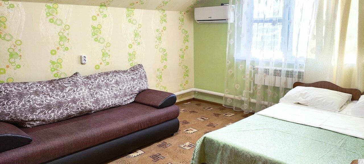 Фотографии номера Семейный номер с террасой в Гостинице Домик у моря Анапа