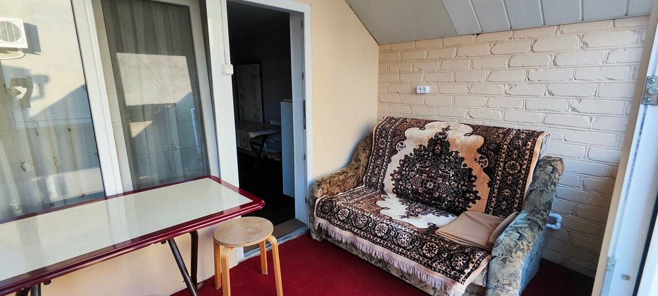 Фотографии номера Семейный номер с террасой в Гостинице Домик у моря Анапа